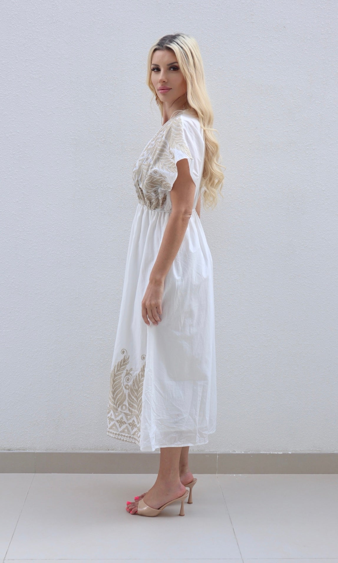 Female model wearing Zara Gold Embroidered Midi Dress - White- showcasing the latest ladies fashion with free delivery