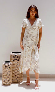 Female model wearing Yasmin Gold Wrap Dress - Cream / Gold- showcasing the latest ladies fashion with free delivery