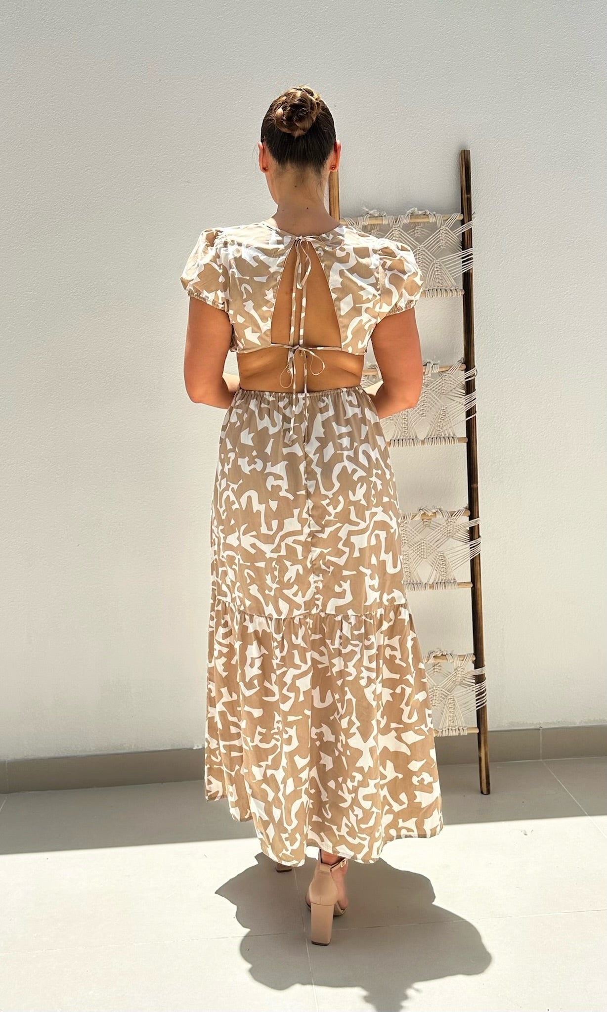 Female model wearing Savanna Open Back Dress - Beige- showcasing the latest ladies fashion with free delivery