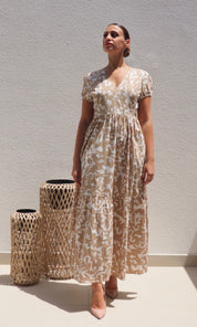 Female model wearing Savanna Open Back Dress - Beige- showcasing the latest ladies fashion with free delivery