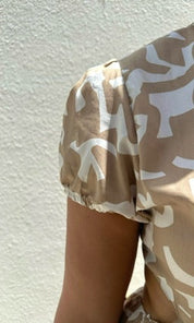 Female model wearing Savanna Open Back Dress - Beige- showcasing the latest ladies fashion with free delivery