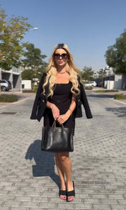 Female model wearing Adrina Shift Dress - Black- showcasing the latest ladies fashion with free delivery