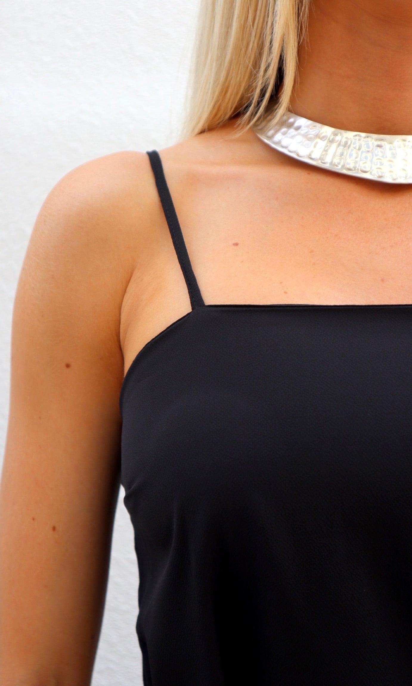 Female model wearing Olivia Strap Wrap-Over Dress - Black- showcasing the latest ladies fashion with free delivery