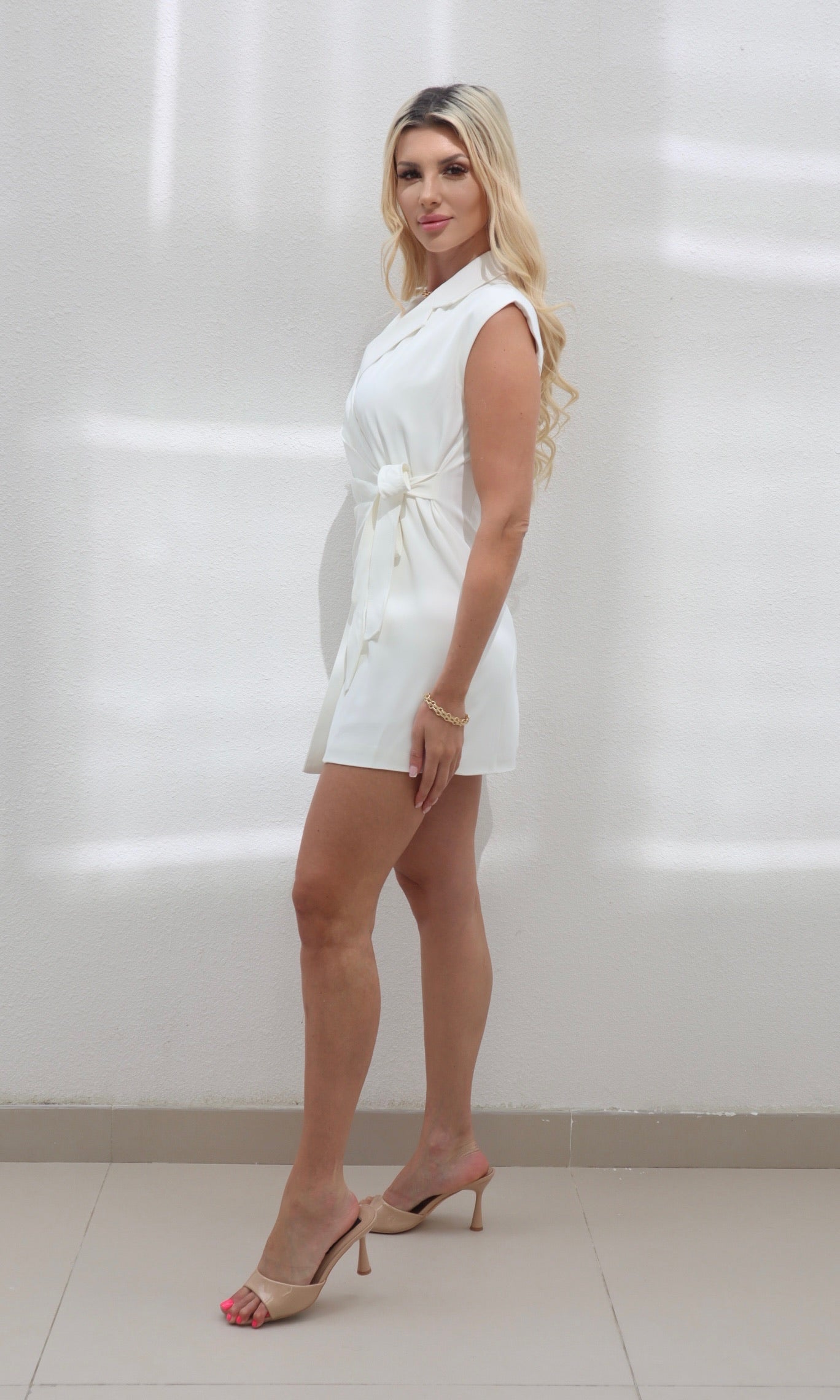 Female model wearing Margot blazer wrap Dress - White- showcasing the latest ladies fashion with free delivery