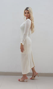 Female model wearing Alika backless Dress- Cream- showcasing the latest ladies fashion with free delivery