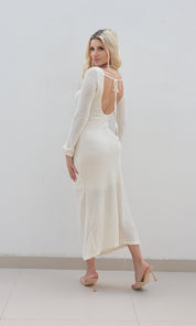 Female model wearing Alika backless Dress- Cream- showcasing the latest ladies fashion with free delivery