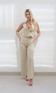 Female model wearing Mimi Halter Top - Beige- showcasing the latest ladies fashion with free delivery