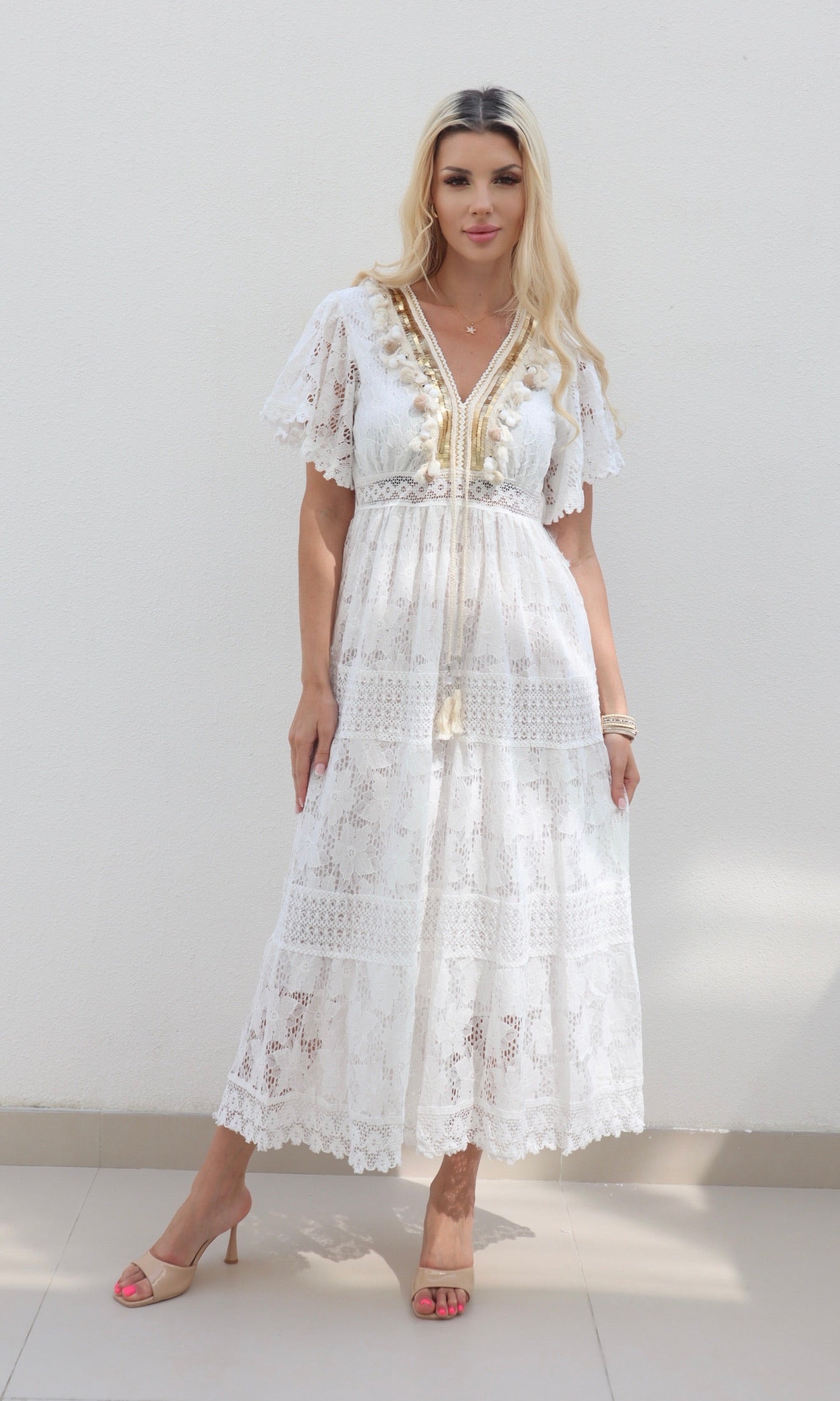 Female model wearing Kayley gold trim crochet maxi - White- showcasing the latest ladies fashion with free delivery