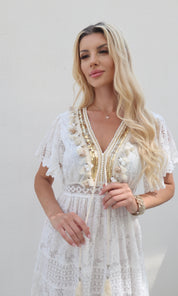 Female model wearing Kayley gold trim crochet maxi - White- showcasing the latest ladies fashion with free delivery