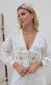 Female model wearing Anastasia Flower Embroidered Top- White- showcasing the latest ladies fashion with free delivery