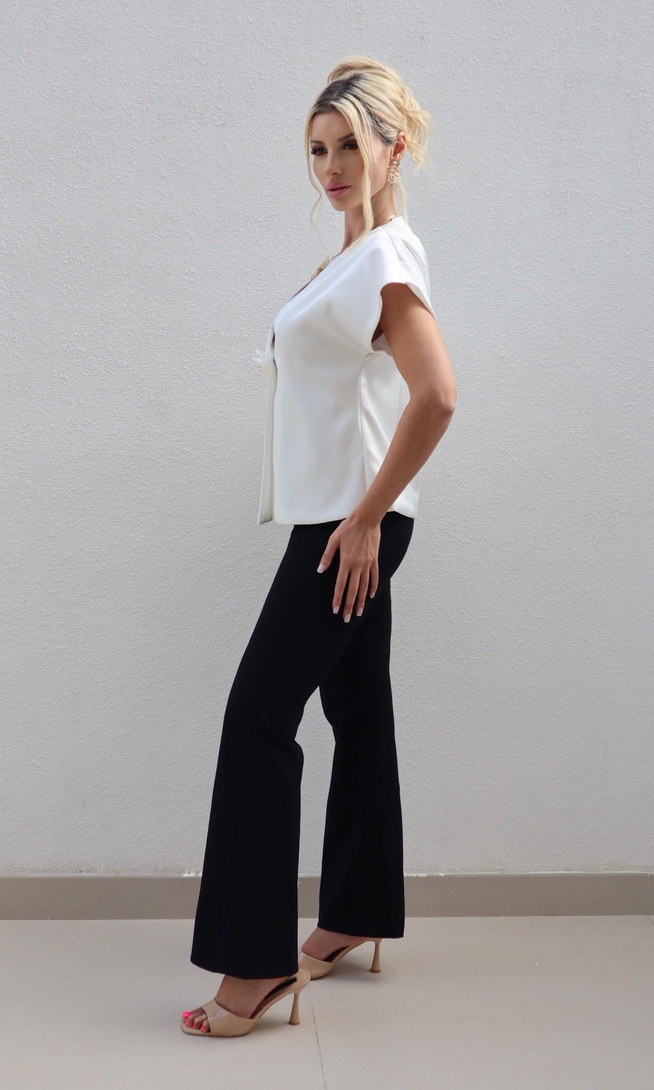 Female model wearing Angelica flower detail Jacket - White- showcasing the latest ladies fashion with free delivery