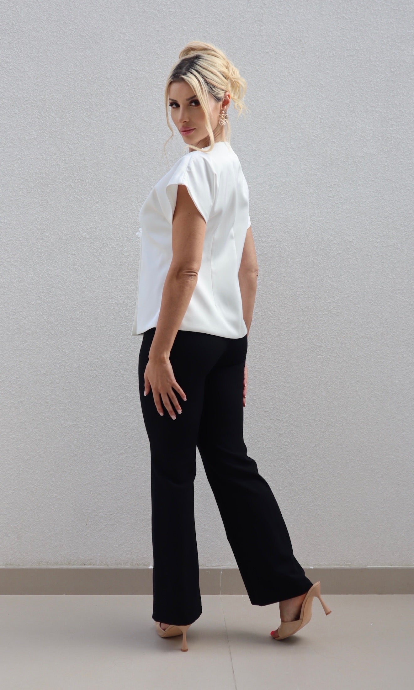 Female model wearing Angelica flower detail Jacket - White- showcasing the latest ladies fashion with free delivery