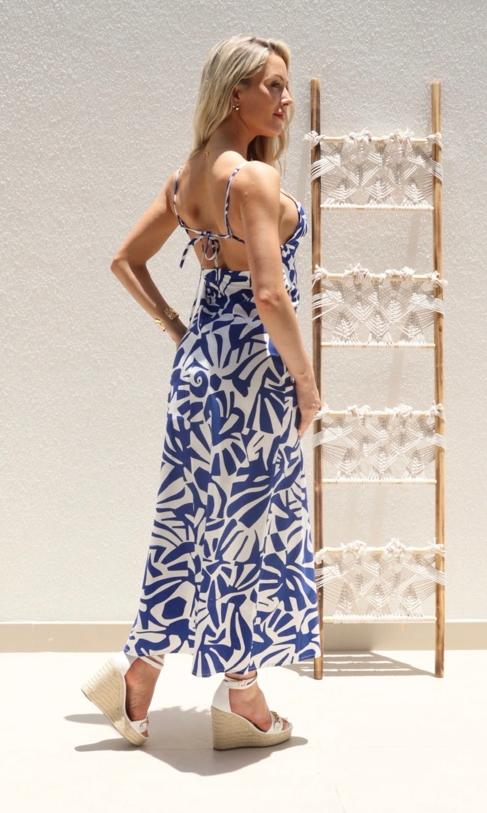 Female model wearing Lucia Open Tie Back Dress - Royal Blue- showcasing the latest ladies fashion with free delivery