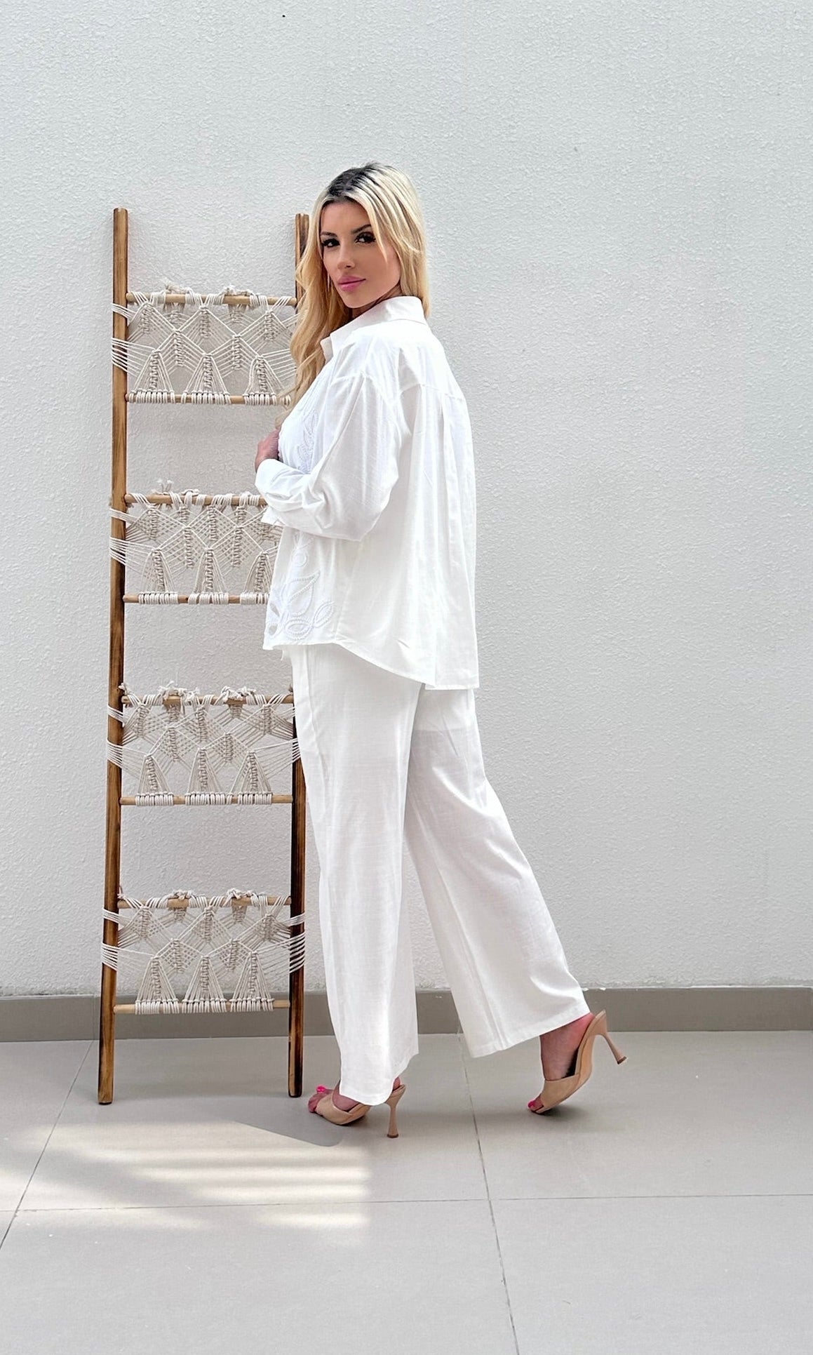 Female model wearing Tuscany Elasticated Trouser - White- showcasing the latest ladies fashion with free delivery