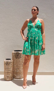 Female model wearing Nikita Cross Back Dress - Green- showcasing the latest ladies fashion with free delivery 