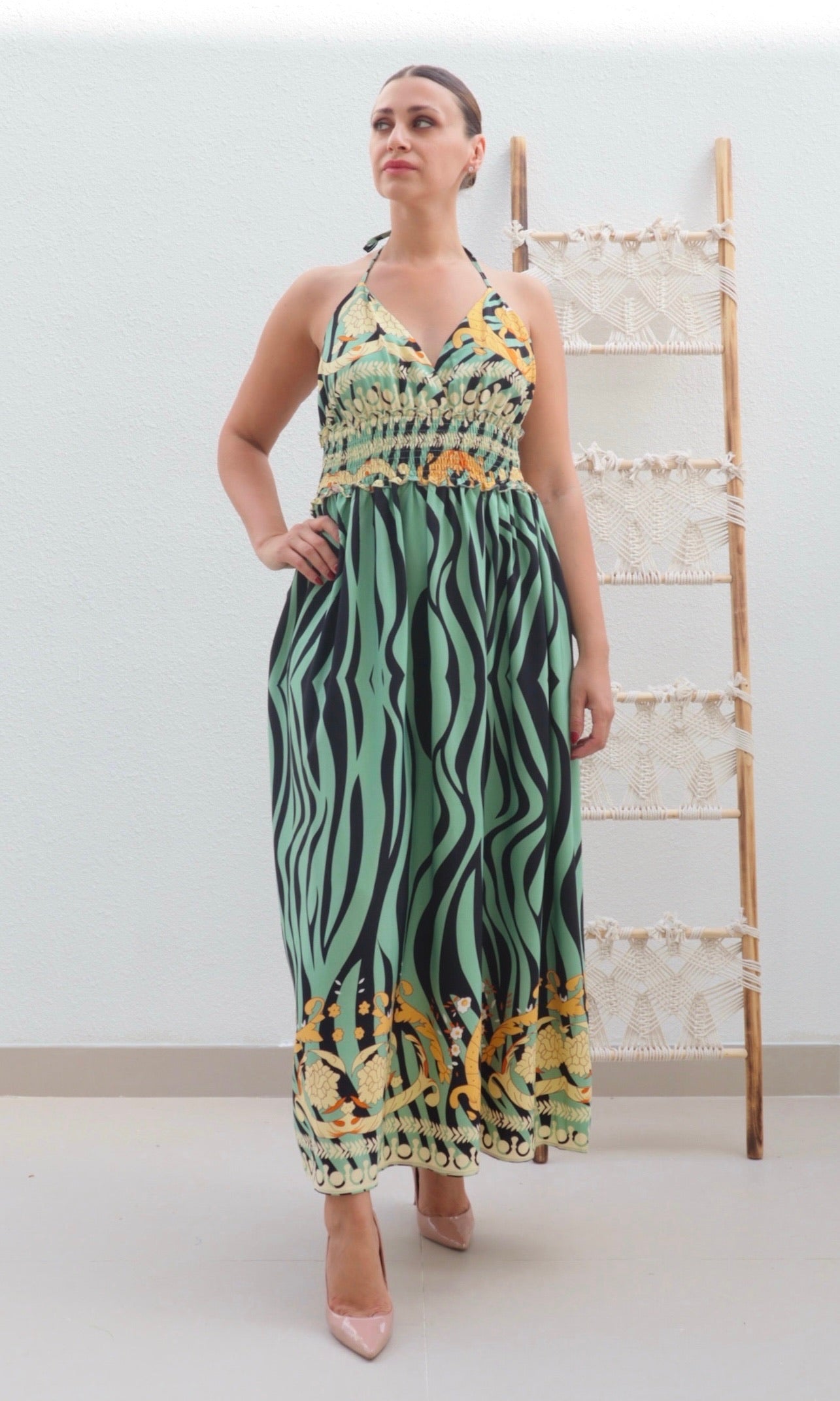 Female model wearing Saskia Halter Dress - Sage- showcasing the latest ladies fashion with free delivery 