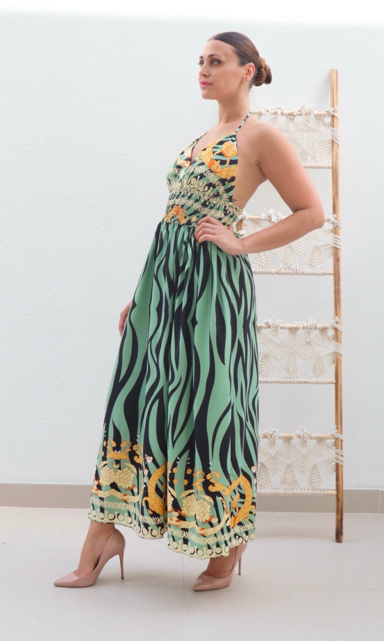 Female model wearing Saskia Halter Dress - Sage- showcasing the latest ladies fashion with free delivery 