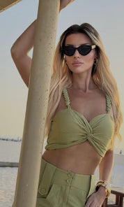 Female model wearing Camilla Twisted Top - Sage- showcasing the latest ladies fashion with free delivery 
