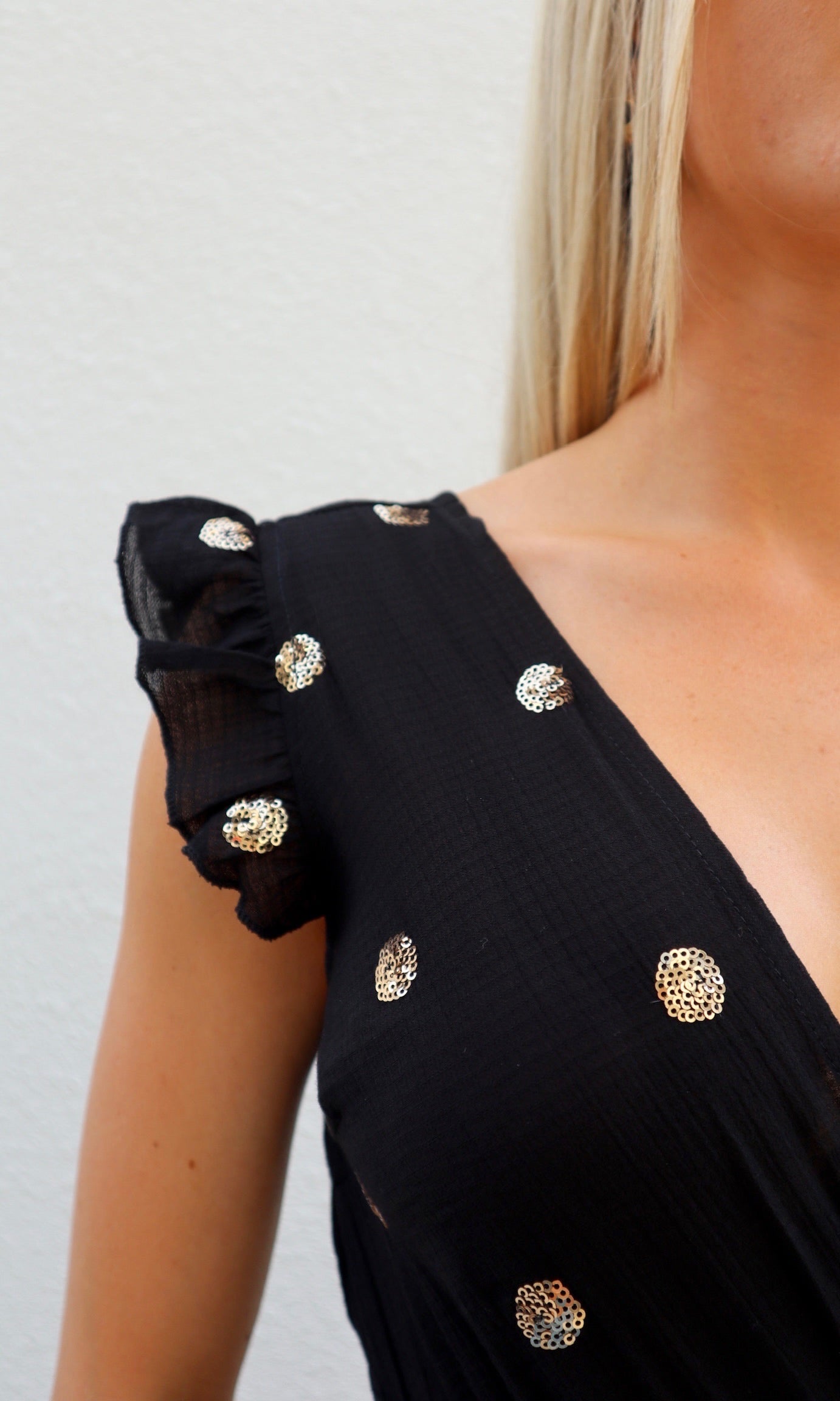 Female model wearing Ella Playsuit - Black- showcasing the latest ladies fashion with free delivery 