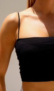 Female model wearing Katrina Crop Top - Black- showcasing the latest ladies fashion with free delivery 