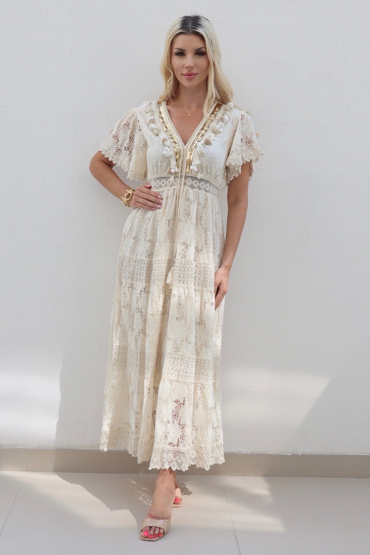 Female model wearing Kayley gold trim crochet maxi - Cream- showcasing the latest ladies fashion with free delivery 