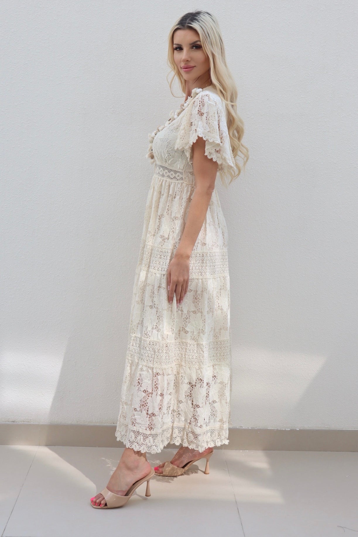 Female model wearing Kayley gold trim crochet maxi - Cream- showcasing the latest ladies fashion with free delivery 