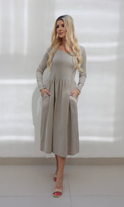 Female model wearing Shyla cord Dress - Stone- showcasing the latest ladies fashion with free delivery 