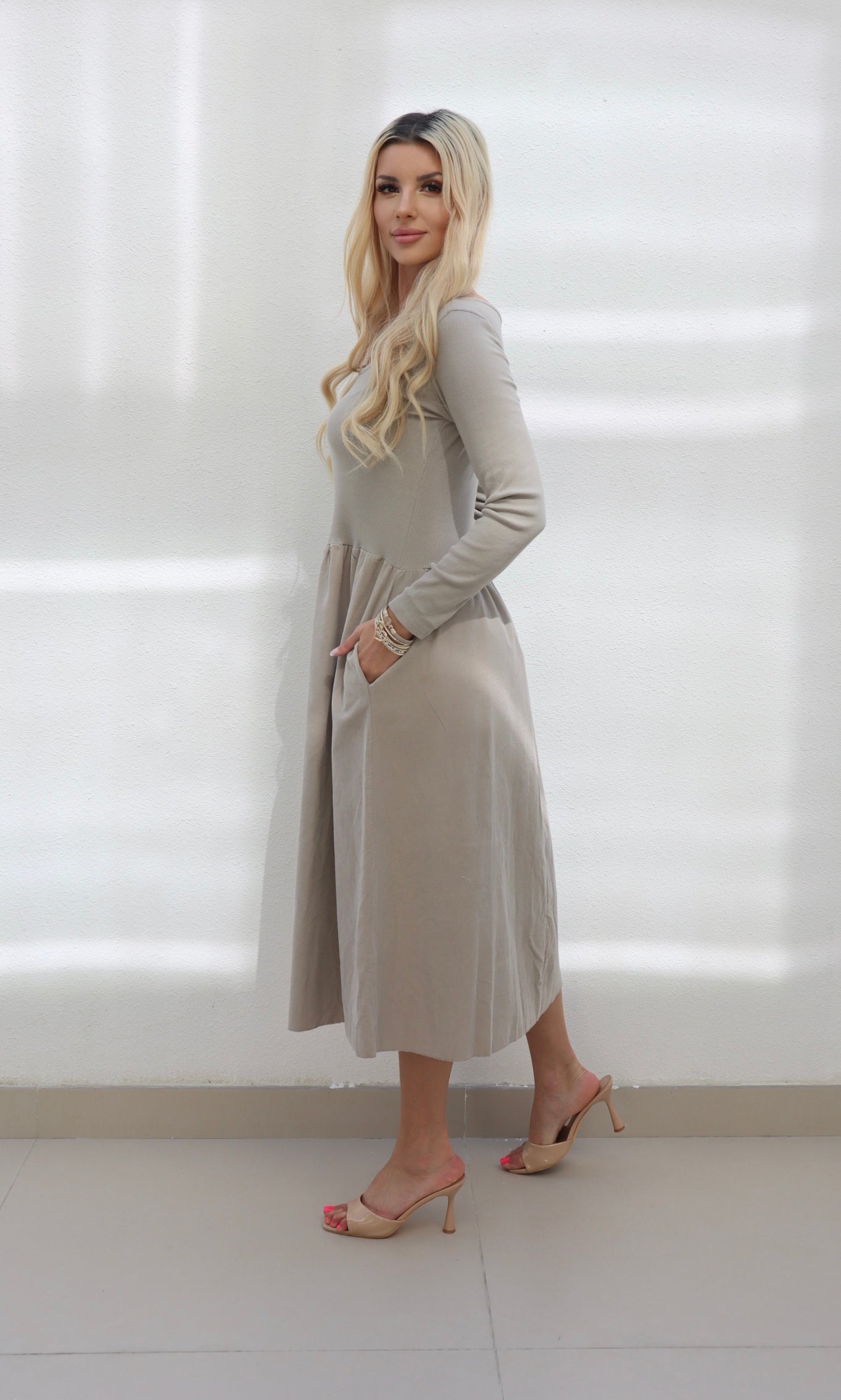Female model wearing Shyla cord Dress - Stone- showcasing the latest ladies fashion with free delivery 