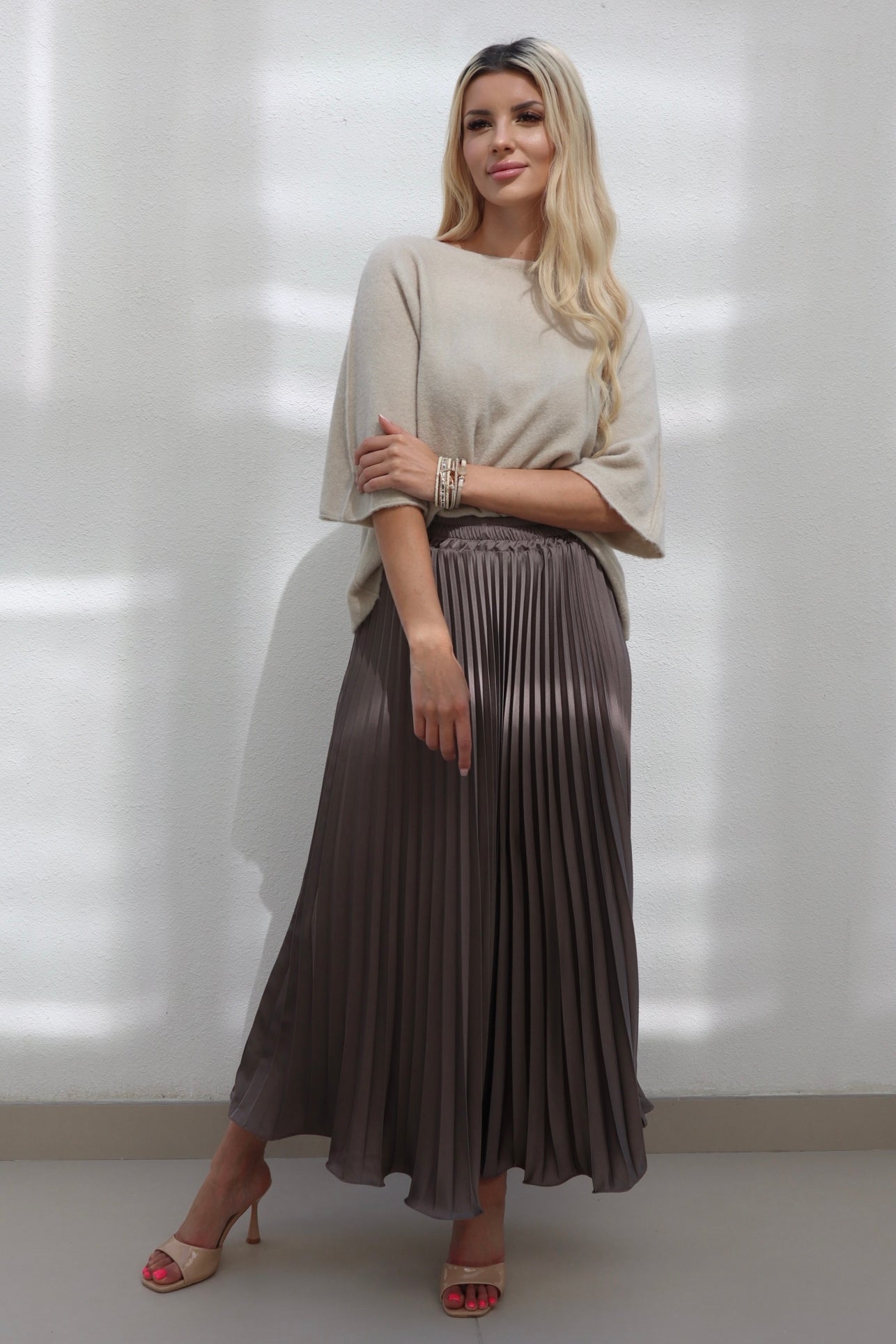 Female model wearing Adele satin pleat skirt - Mocha- showcasing the latest ladies fashion with free delivery 