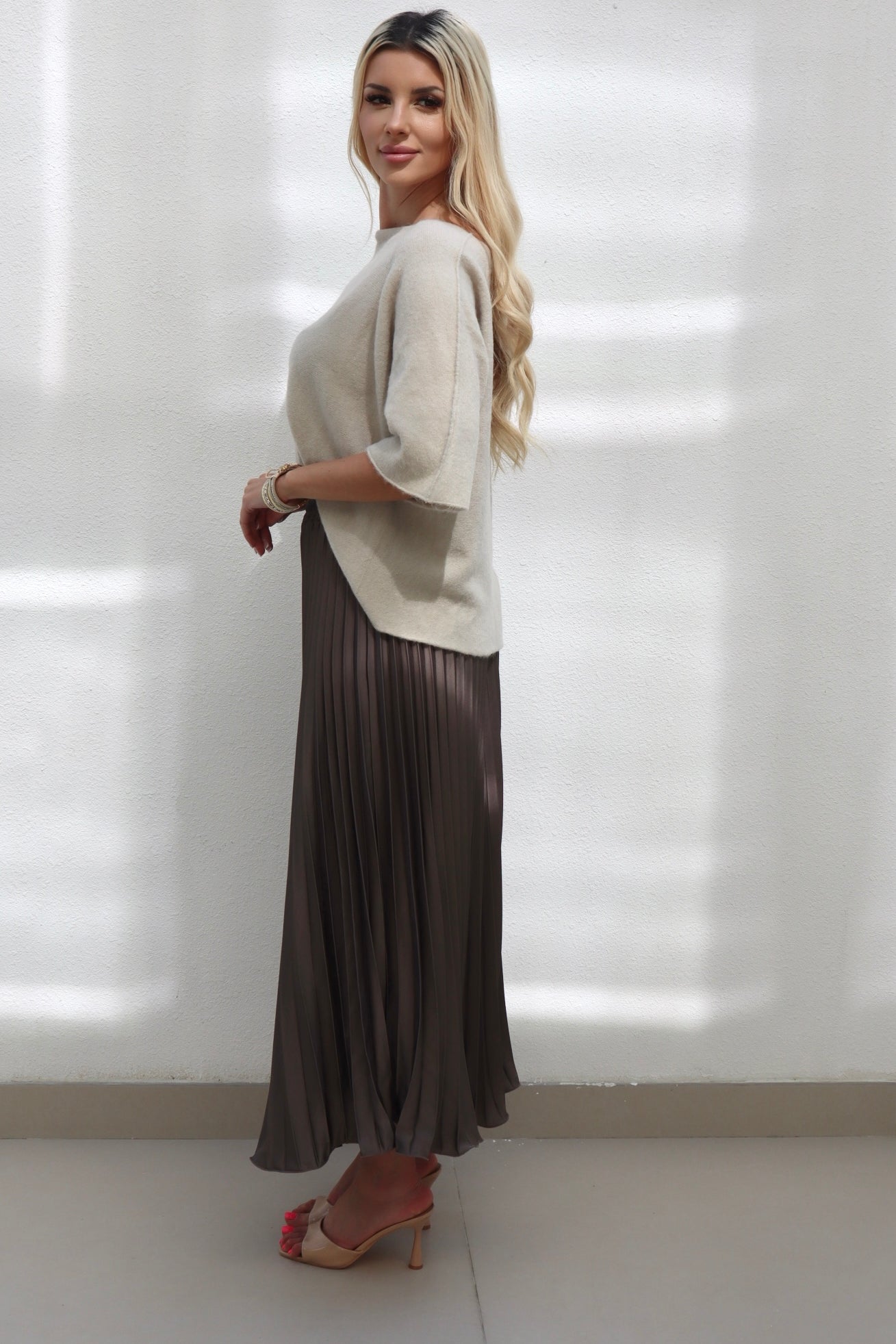 Female model wearing Adele satin pleat skirt - Mocha- showcasing the latest ladies fashion with free delivery 