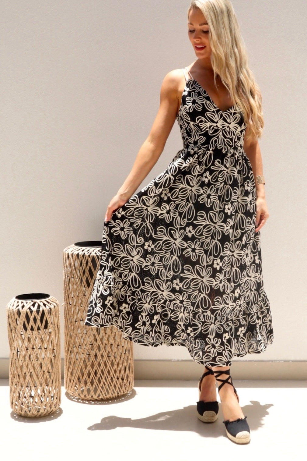 Female model wearing Simona Embroidered Dress - Black- showcasing the latest ladies fashion with free delivery 