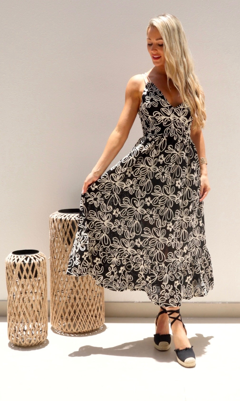 Female model wearing Simona Embroidered Dress - Black- showcasing the latest ladies fashion with free delivery 