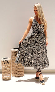 Female model wearing Simona Embroidered Dress - Black- showcasing the latest ladies fashion with free delivery 