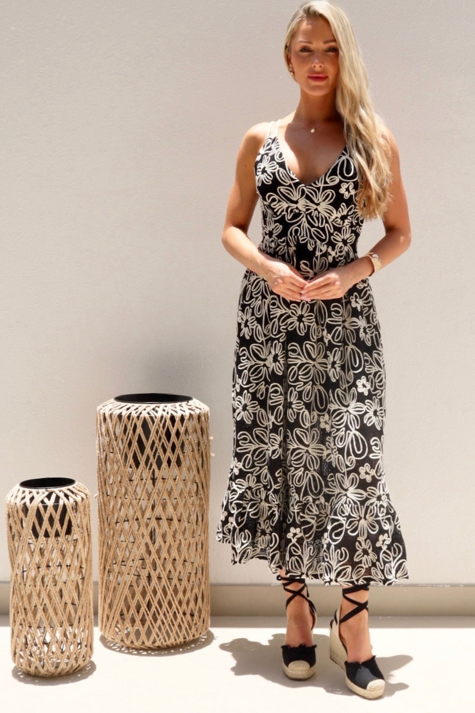 Female model wearing Simona Embroidered Dress - Black- showcasing the latest ladies fashion with free delivery 
