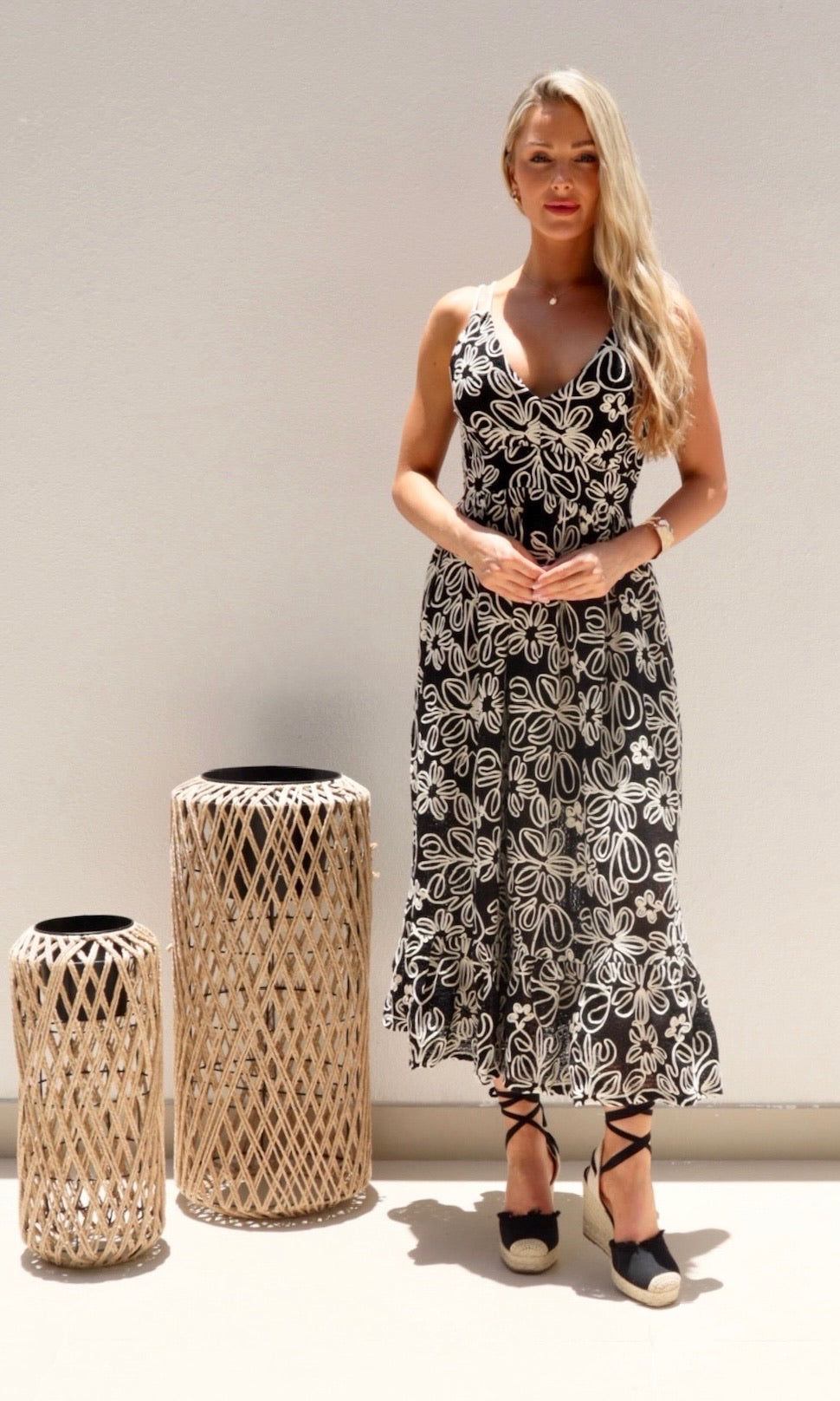 Female model wearing Simona Embroidered Dress - Black- showcasing the latest ladies fashion with free delivery 