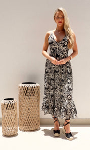 Female model wearing Simona Embroidered Dress - Black- showcasing the latest ladies fashion with free delivery 