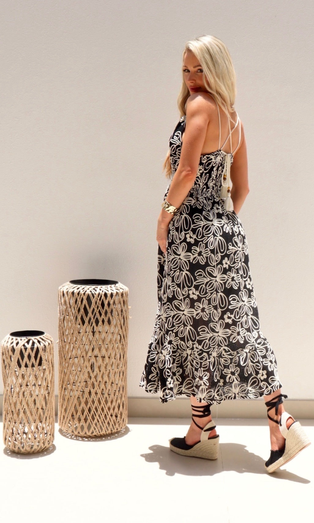 Female model wearing Simona Embroidered Dress - Black- showcasing the latest ladies fashion with free delivery 