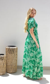 Female model wearing Thea Beaded V Front & Back Dress - Green- showcasing the latest ladies fashion with free delivery 