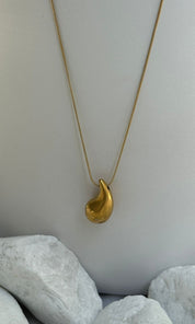 Female model wearing Lolita Gold Necklace- showcasing the latest ladies fashion with free delivery 